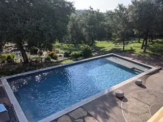 Pool remodel progress — coping installation closeup
