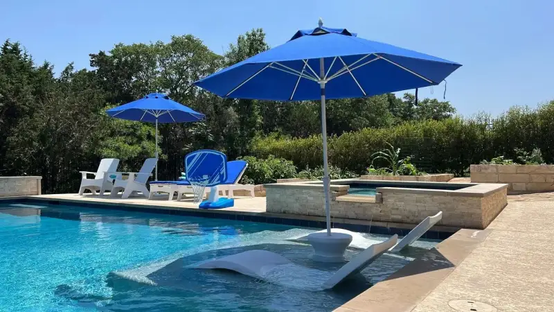 Founder on Austin job site discussing pool remodeling scope