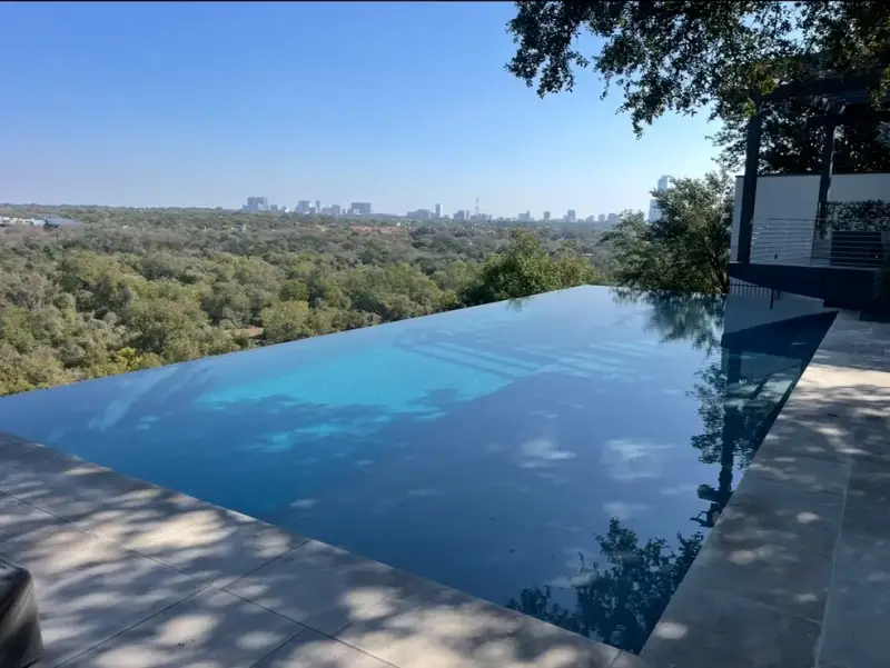 Professional technician completing Austin pool renovation