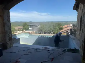 Austin pool plaster, tile & coping close-up by professional pool remodeling team